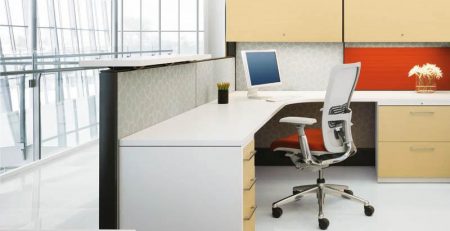 office cubicle with windows behind